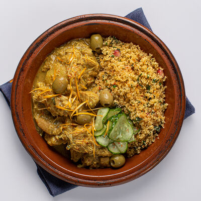 Тажин с курицей и кускус в Claudia по цене 1430 ₽