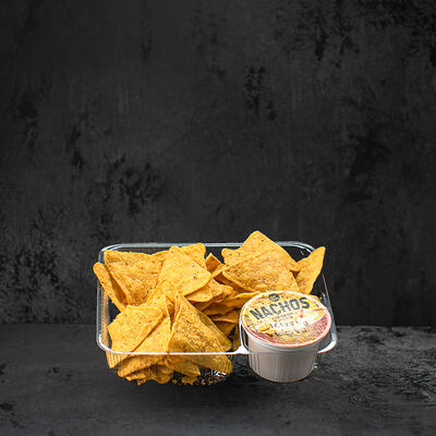 Чипсы начос с сырным соусом в Starmax Cinema по цене 300 ₽