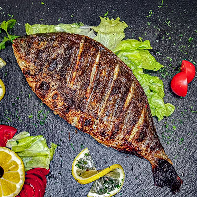 Дорадо на мангале в Хочу мясо по цене 1150 ₽