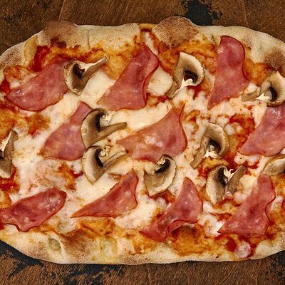 Пицца римская с ветчиной и грибами в Пицца паста и баста по цене 649 ₽