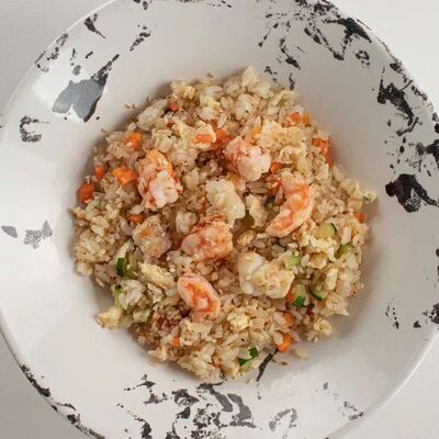 Жареный рис с морепродуктами в Here sushi по цене 1050 ₽