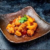 Курица в кисло-сладком соусе с манго в Asia
