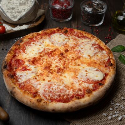 Пицца Маргарита в Прожар по цене 740 ₽