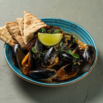 Мидии в соусе том ям в Миндаль по цене 708 ₽