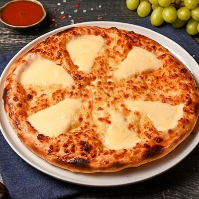 Хачапури королевский в Три хинкали&Шашлык по цене 1150 ₽