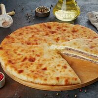 Осетинский пирог с мясом и сыромв Пироговая компания