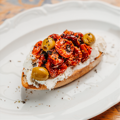 Брускетта с запеченными томатами в У БЕЛЛУЧЧИ круче по цене 260 ₽