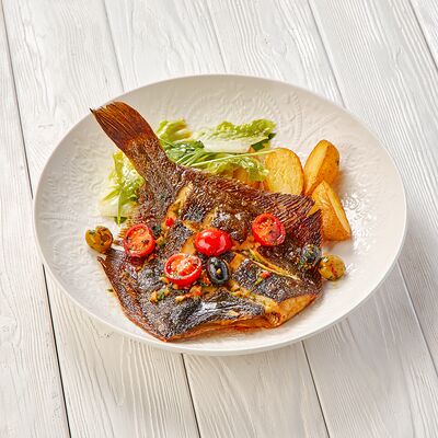 Камбала запеченнаяв Пармезан по цене 775 ₽