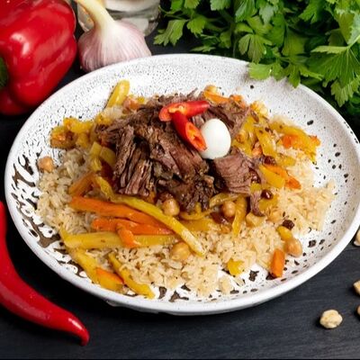 Плов с говядиной в Узбекская кухня 24 часа по цене 587 ₽