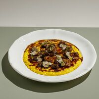 Ризотто алла Миланезе с утиными сердечками и чёрным трюфелем в Italy