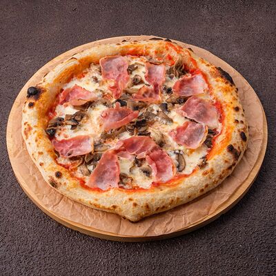 Пицца Ветчина-грибы в Cosmo пицца пучча по цене 812 ₽