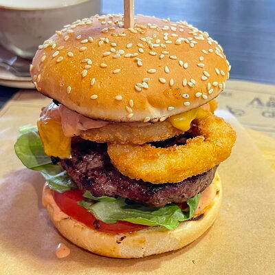 Бургер луковый Бро в Romero steak по цене 720 ₽