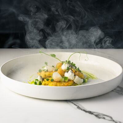 Драники с подкопченным палтусом и щучьей икрой в Bruni Prosecco Bar по цене 990 ₽