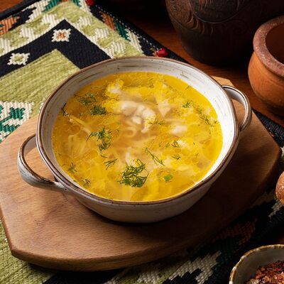 Куриный бульон с домашней лапшой в Пхали по цене 495 ₽