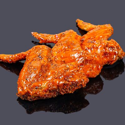 Крылья в соусе баффало в Булка и Мясо по цене 450 ₽