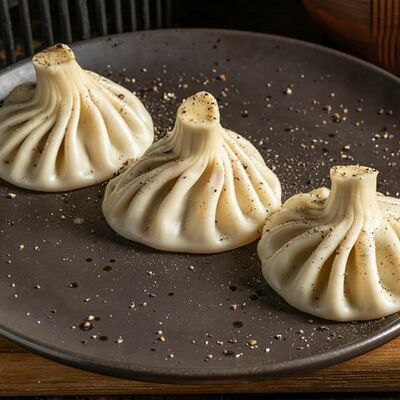 Хинкали по-грузинскив Lariote по цене 450 ₽