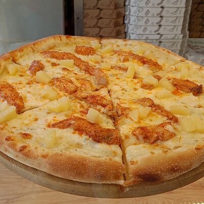 Пицца Курица-Ананас в Жарко вкусно по цене 750 ₽