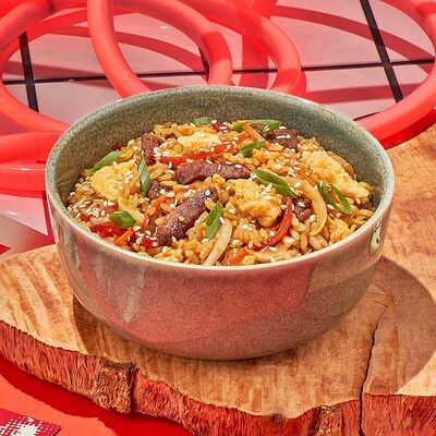 Рис с говядиной и яйцом в Dostaевский по цене 573 ₽