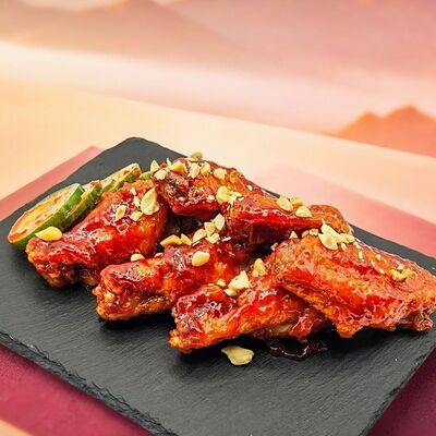 Крылышки в остром соусе по-корейски в Лапша и Утки по цене 537 ₽