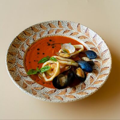 Томатный суп с морепродуктамив Romanico по цене 890 ₽