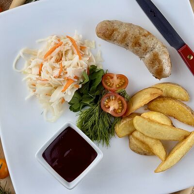 Колбаски жареные свино-говяжьив Корпус О бар по цене 470 ₽