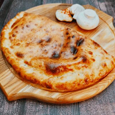 Кальцоне с курицей и грибамив Парго Пицца по цене 760 ₽