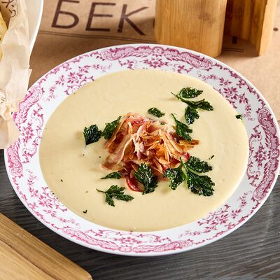 Картофельный крем-суп с беконом и луком порейв Restobar Бекон по цене 500 ₽