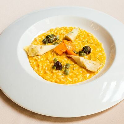 Ризотто с тыквой, артишоками и таджасские маслинами в Беллуччи по цене 430