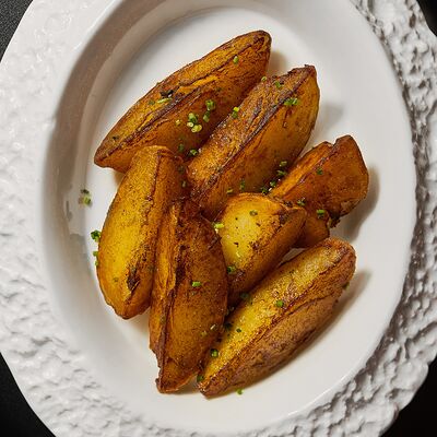 Картофель в специях с ароматными маслами и зеленым луком в Великий Goodwine по цене 390 ₽