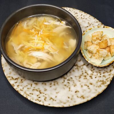 Куриный суп с лапшой в Пойдем зайдем по цене 390 ₽