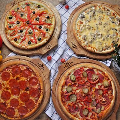 4 пиццы в Андеграунд Pizza & Sushi по цене 1747 ₽