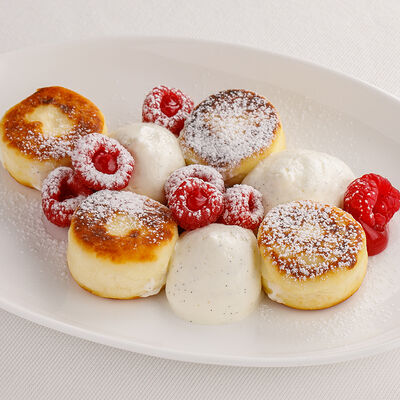 Сырники с малиной в Harvest по цене 1150 ₽