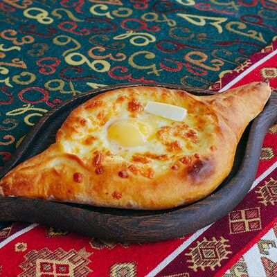 Хачапури по-аджарски в Багратиони по цене 585 ₽