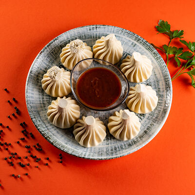 Хинкали с курицей в Аджарули по цене 110 ₽