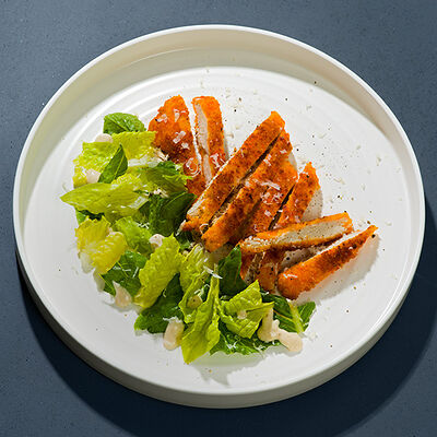 Котолетта с легким салатом цезарь в Yami Yami по цене 815 ₽