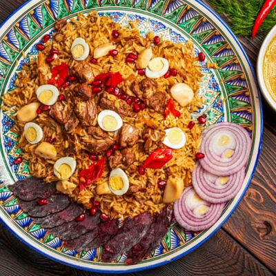 Плов восточныйв РОХАТ ФЮЖНЬ по цене 490 ₽