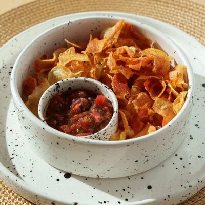 Чипсы картофельные с томатной сальсой в En Ferio по цене 300 ₽