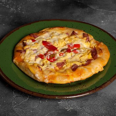 Пицца в Сирийская шаурма по цене 190 ₽