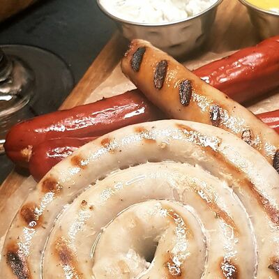 Ассорти колбаски гриль в Travel Рестобар по цене 790 ₽