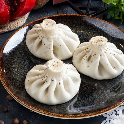 Хинкали с говядиной и бараниной в Чинтамани по цене 500 ₽