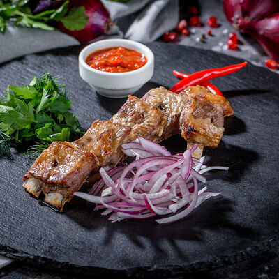 Шашлык из бараньих ребер в Долшашлык по цене 970 ₽