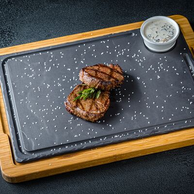 Медальоны из телятины в Florentini City Café по цене 1350 ₽