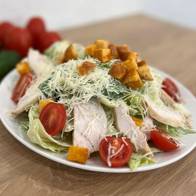 Цезарь с курицей в Atmosphere по цене 660 ₽