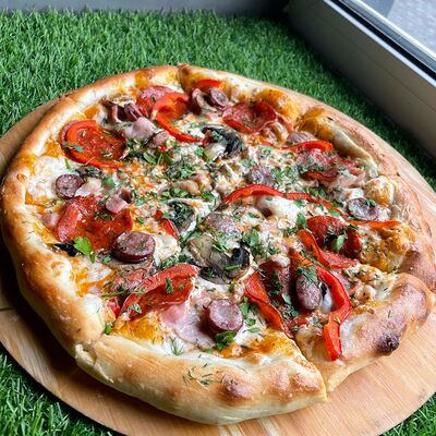 Пицца Супермясная в Barxan по цене 560 ₽