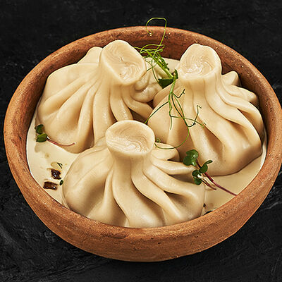 Хинкали с картофелем и грибами в сливочном соусе в LAFALounge & cafe по цене 505 ₽