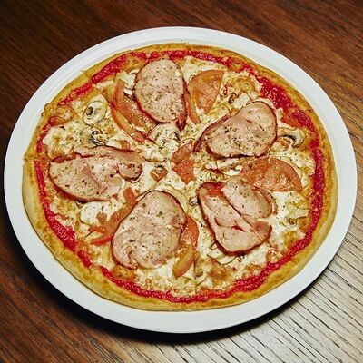 Пицца с ветчиной и грибами в Тбиладжио по цене 770 ₽