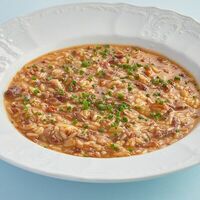 Орзо с томлёной говяжьей щекой и вялеными томатами в БульВар