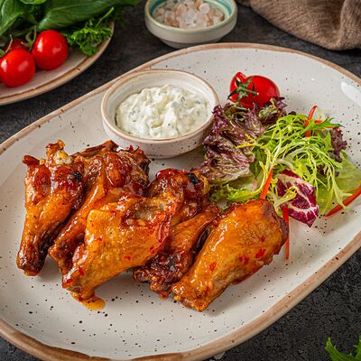 Острые куриные крылышкив Поляна по цене 750 ₽