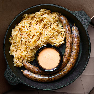 Утиные колбаски с савойской капустой в Бибирево по цене 1200 ₽