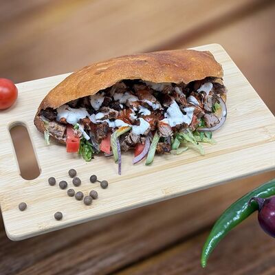 Донер в пите с курицей в Донар на мангале по цене 490 ₽